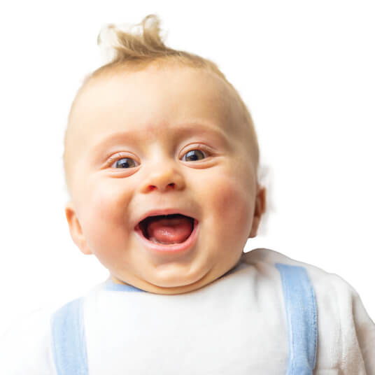 Cute baby with happy face and spunky hair